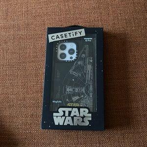 Casetify Star Wars iPhone 13 Pro case. Millenium Falcon.